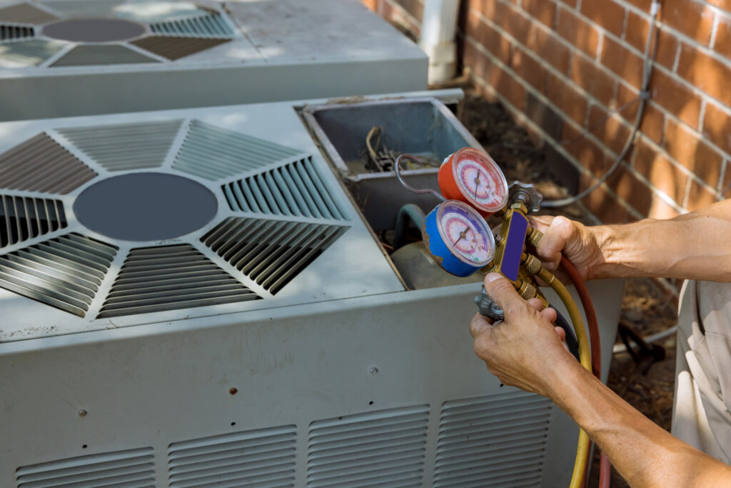 Air conditioning technicians performing emergency HVAC repairs in Ann Arbor, MI.